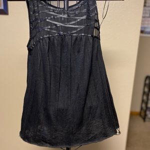Black sleeveless with accents